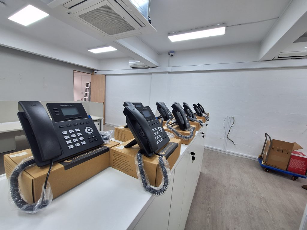 Side view of SIP phones in 2 rows for new pffice