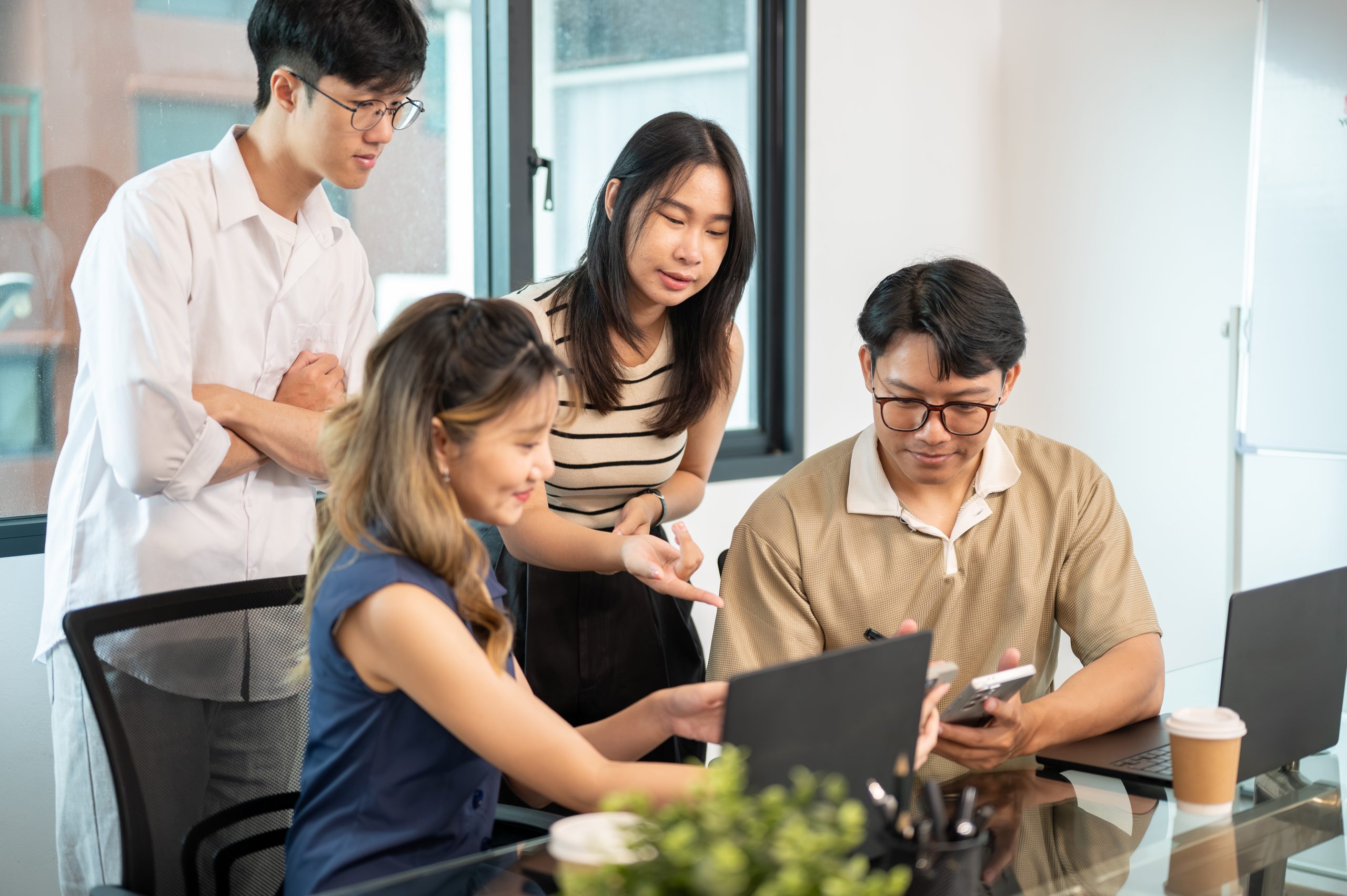 IT Support team looking at PC